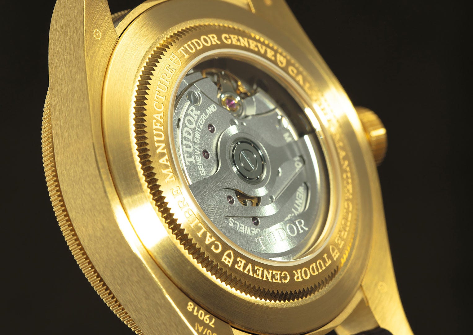 The MT5400 is visible through the sapphire caseback of the gold and silver models only